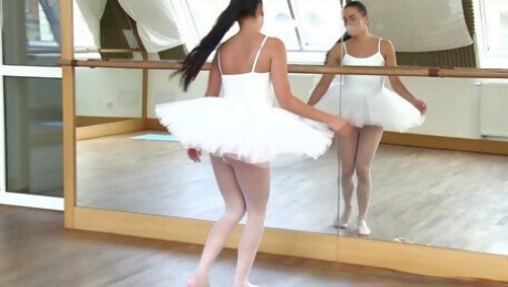 Beautiful ballerina called Evelyn pushes the fingers into her slit