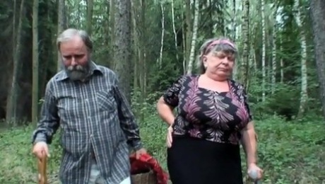 Perverted granny is sucking in the forest